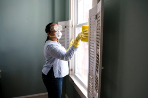a lady in the mold removal process